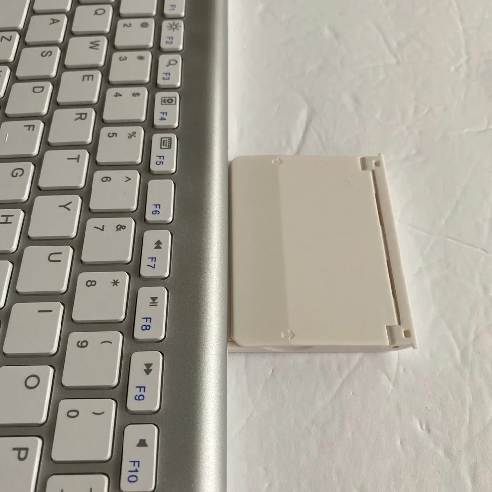 Omoton Bluetooth keyboard with sliding stand